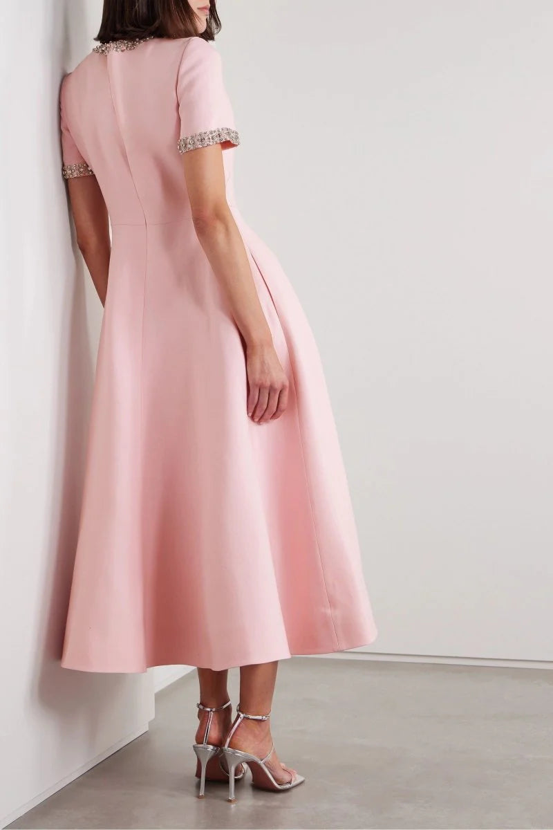 Zoe | Abito midi con fiocco e decorazioni in cristallo